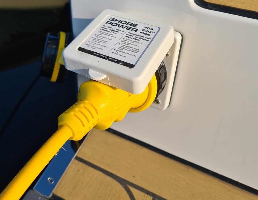 Shore power connection of an electric boat