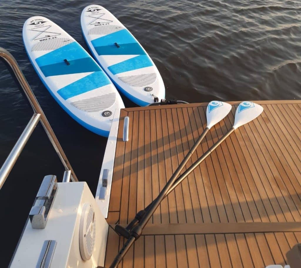 Rent a stand up paddle board with your boating holiday
